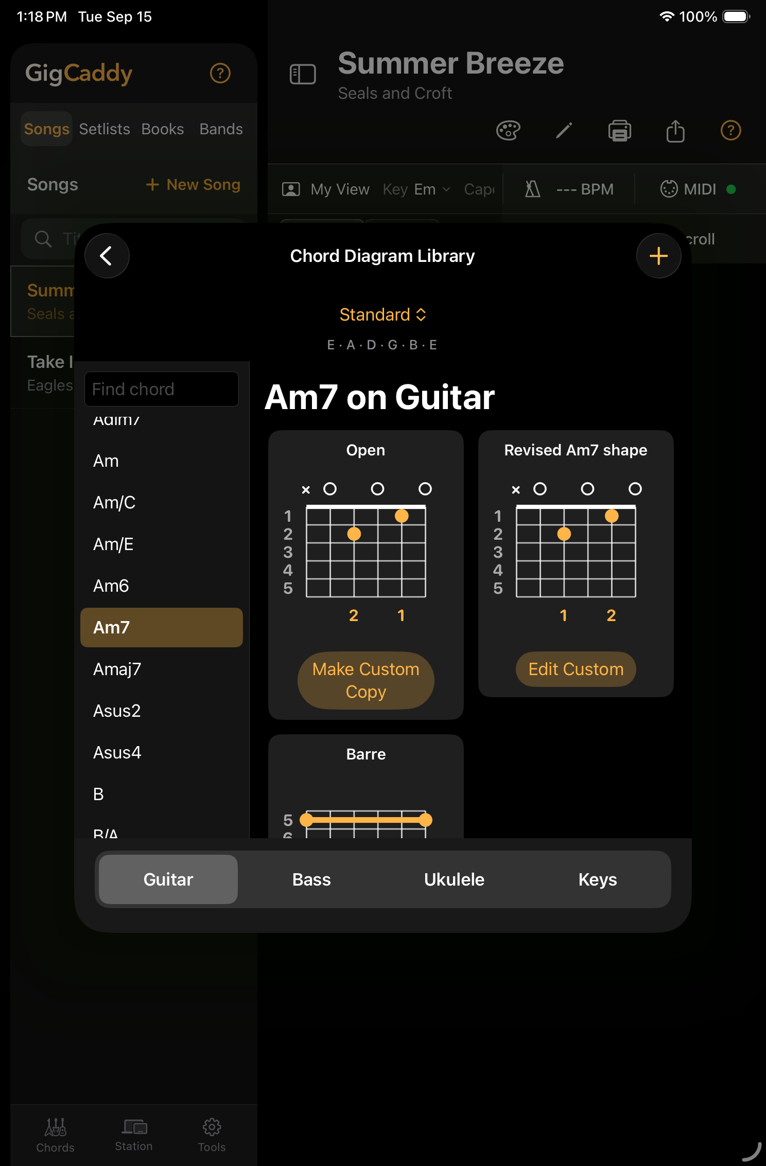GigCaddy chord diagram library open on an iPad, showing guitar chord shapes beside a song library